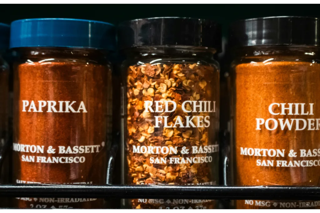 plastic jars stored on a self.
