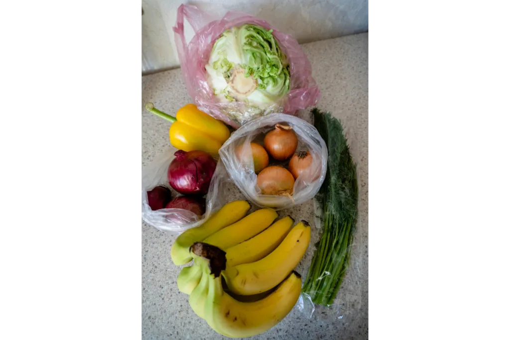 Bananas and other veggies placed on table-Keep produce fresh longer