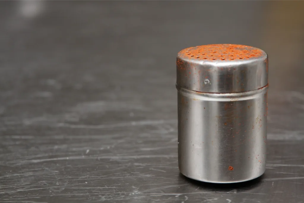 A steel jar placed on a counter.