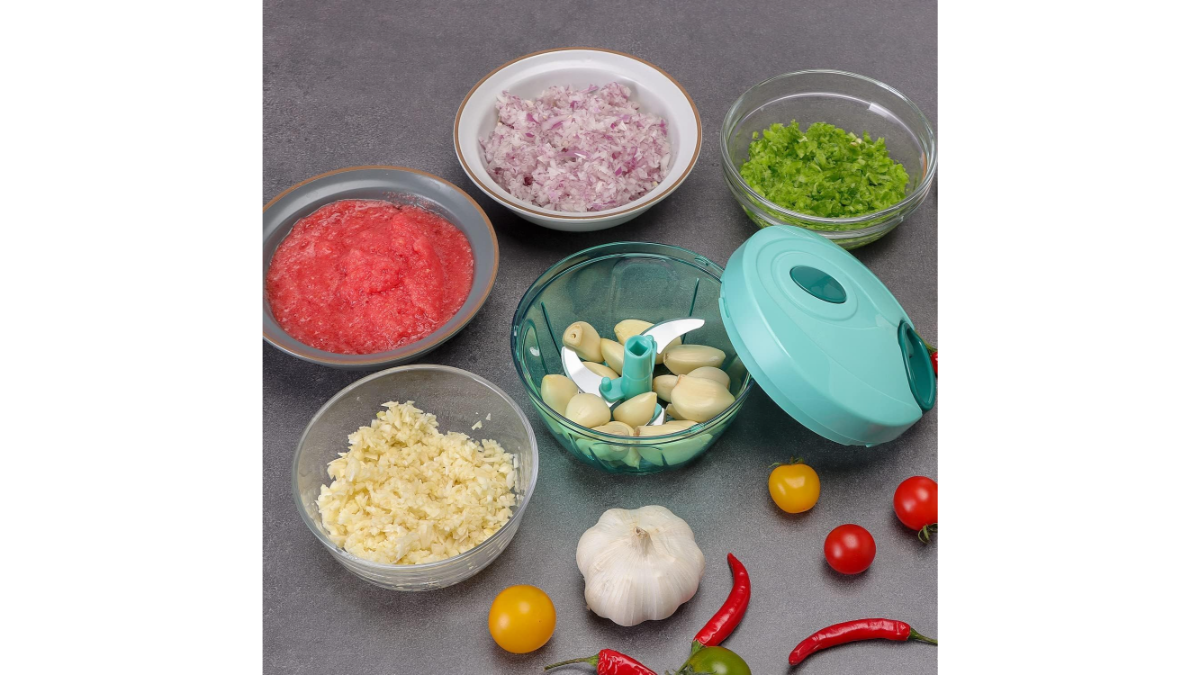 Compact vegetable chopper with stainless steel blades for quick meal prep.