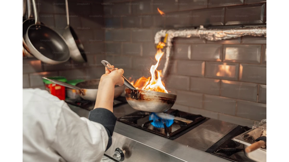 A well-organized kitchen setup with safe cooking practices to prevent accidents.
