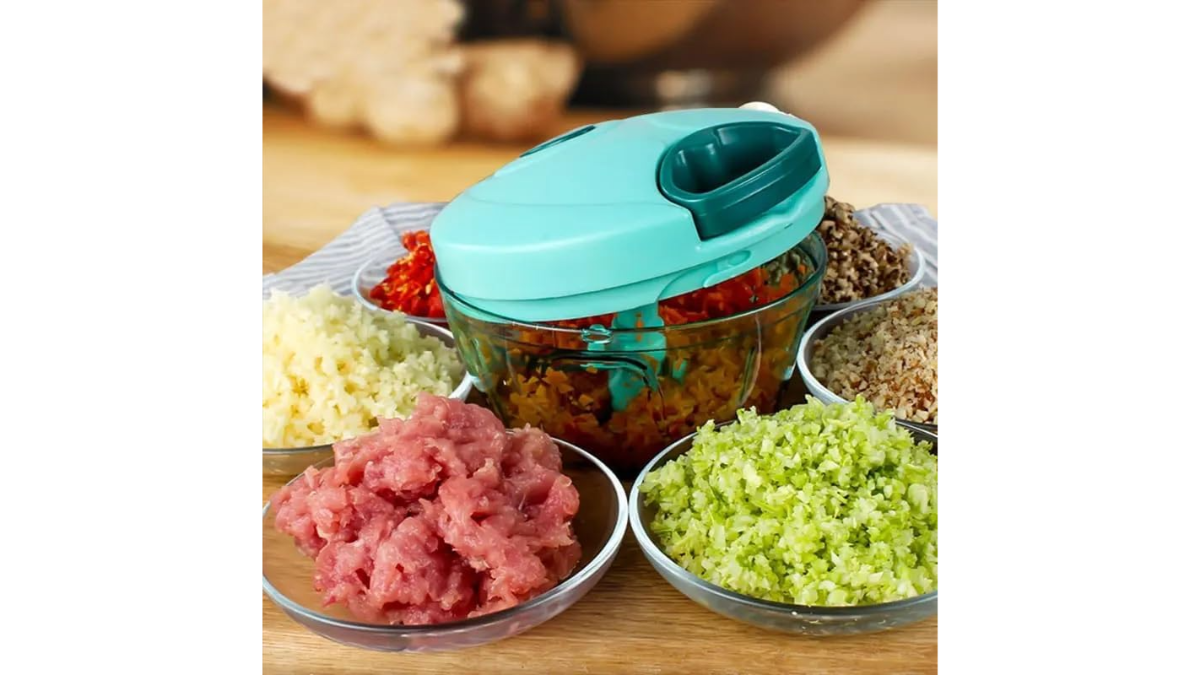 Freshly chopped garlic and chilies in a vegetable chopper.