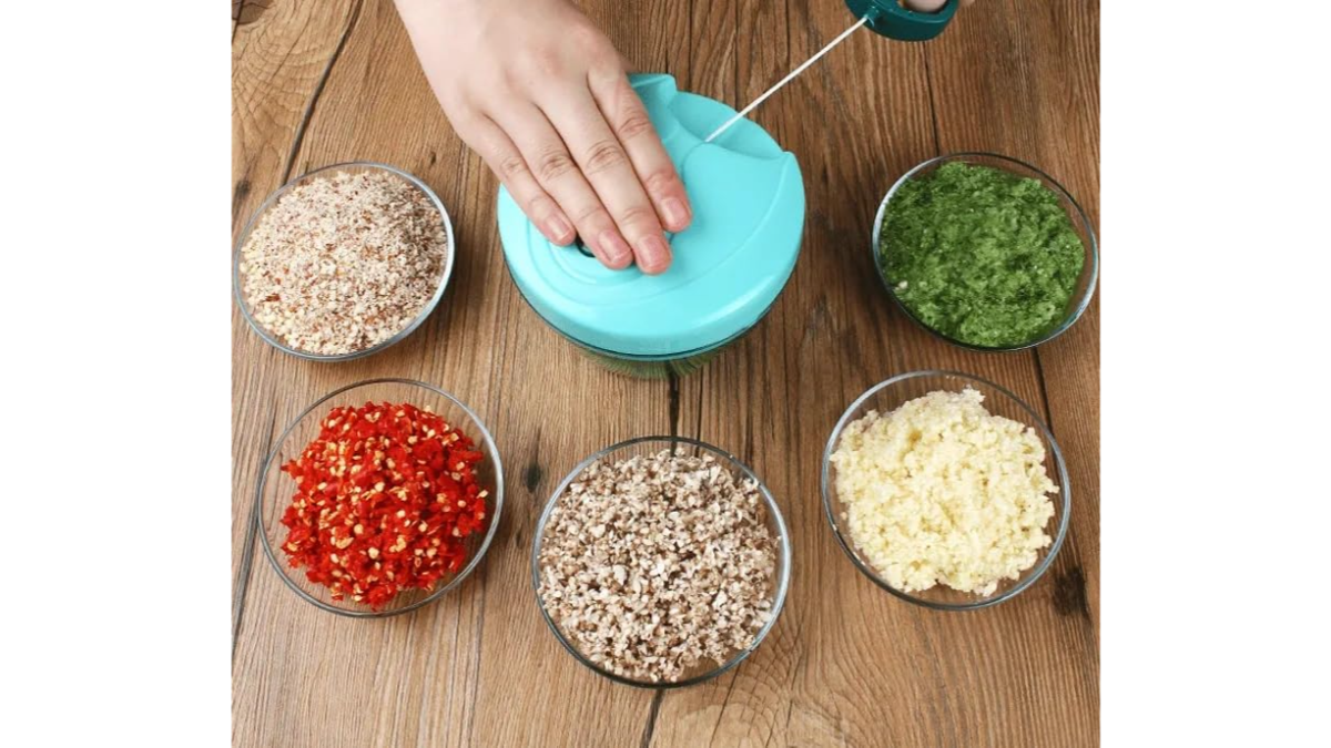 A person using a vegetable chopper to prepare ingredients effortlessly